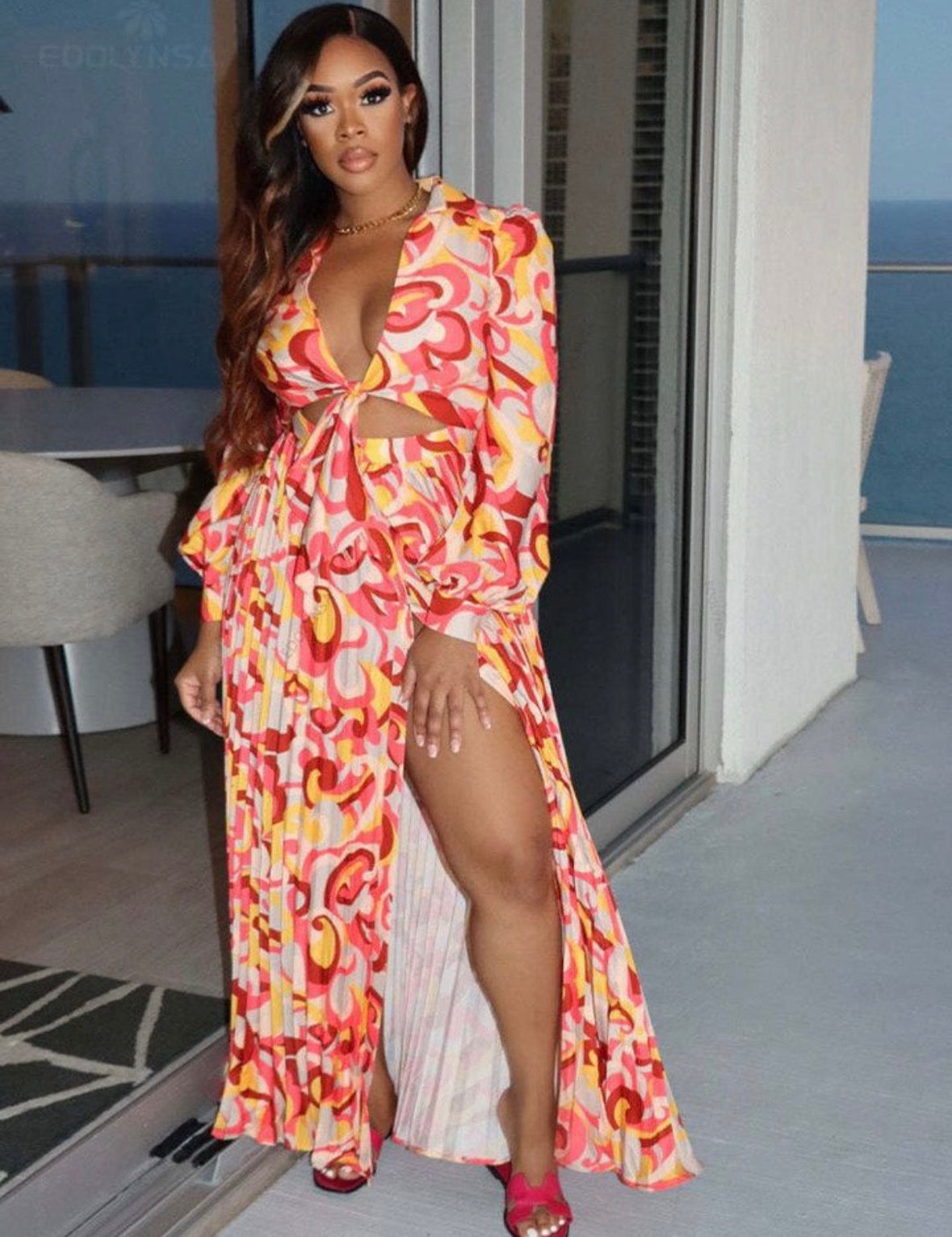 Women’s open leg skirt long sleeve top, tie and multi design long dress