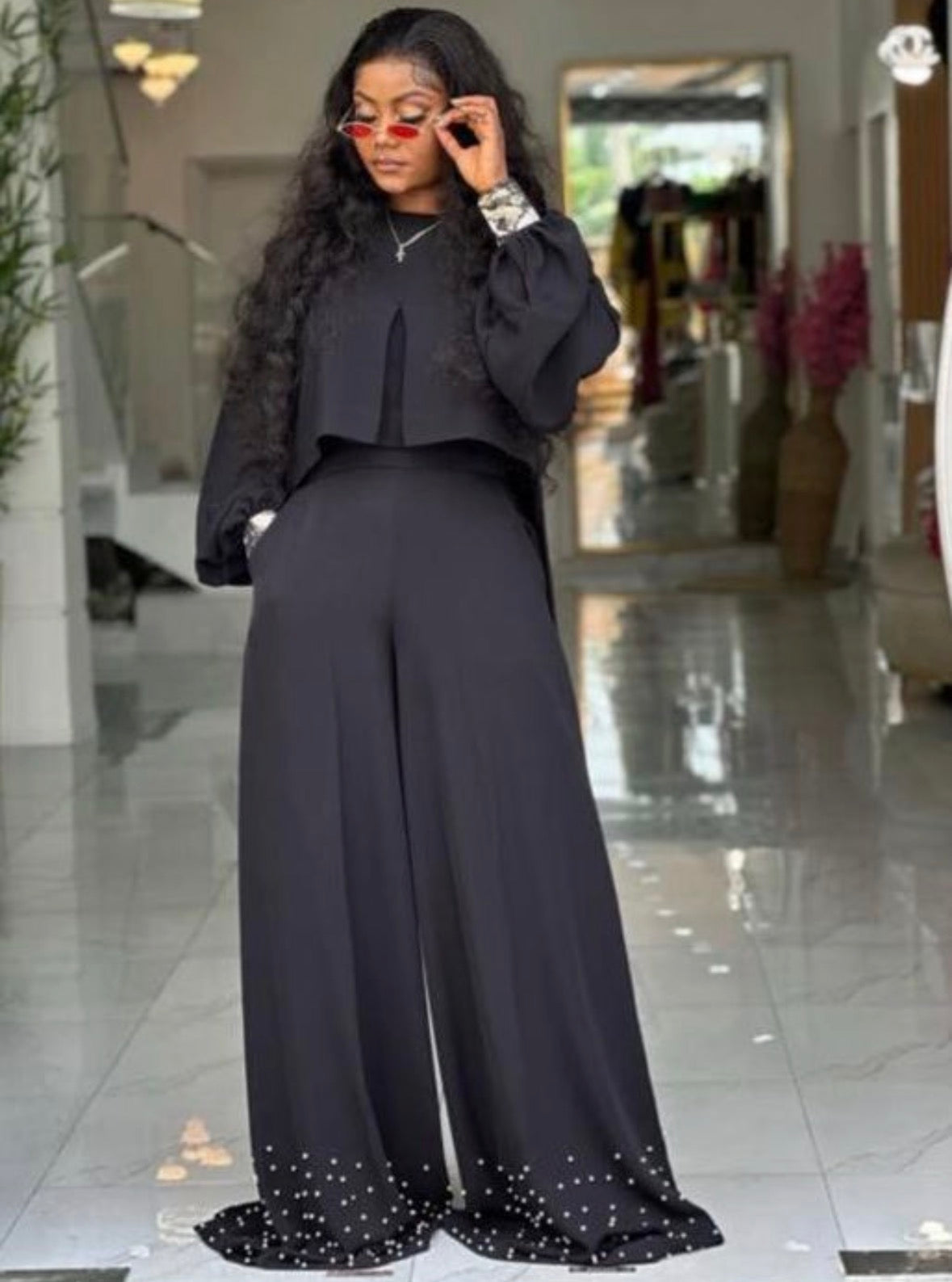 Women’s elegant black 2 pc baggy pants with rhinestone decor and long sleeve top