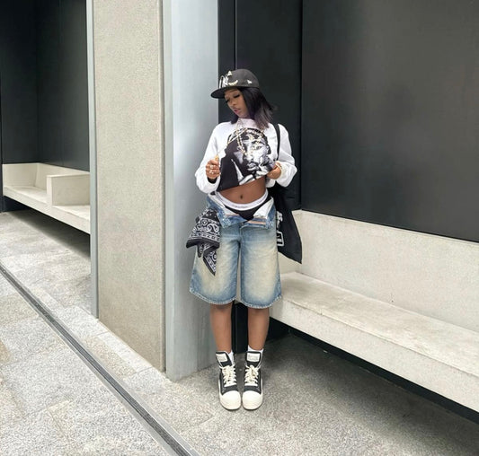 Women’s medium wash brown faded loose street y2k denim shorts jorts