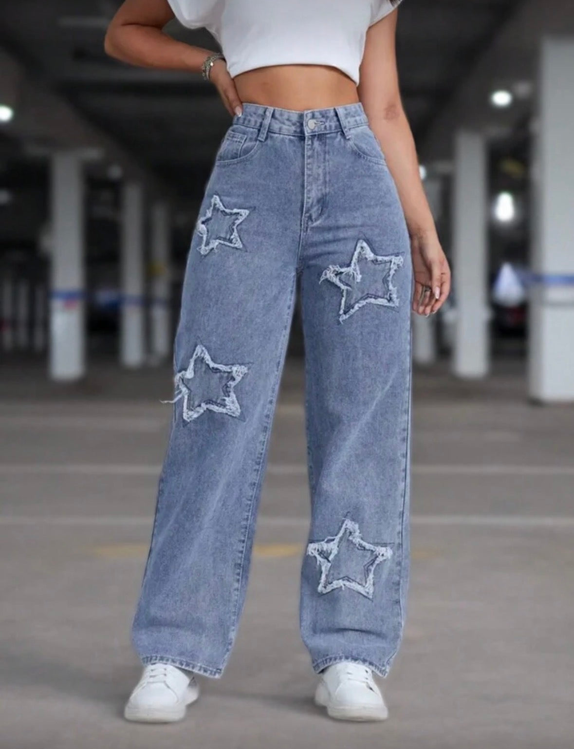 Medium wash star patterned denim pocket jeans
