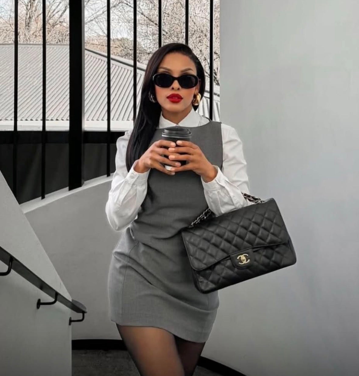 Women’s elegant 2 piece grey sleeveless mini dress and white long sleeve shirt