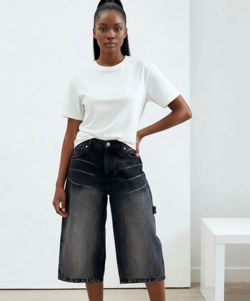 Women’s faded long baggy dark wash jean shorts