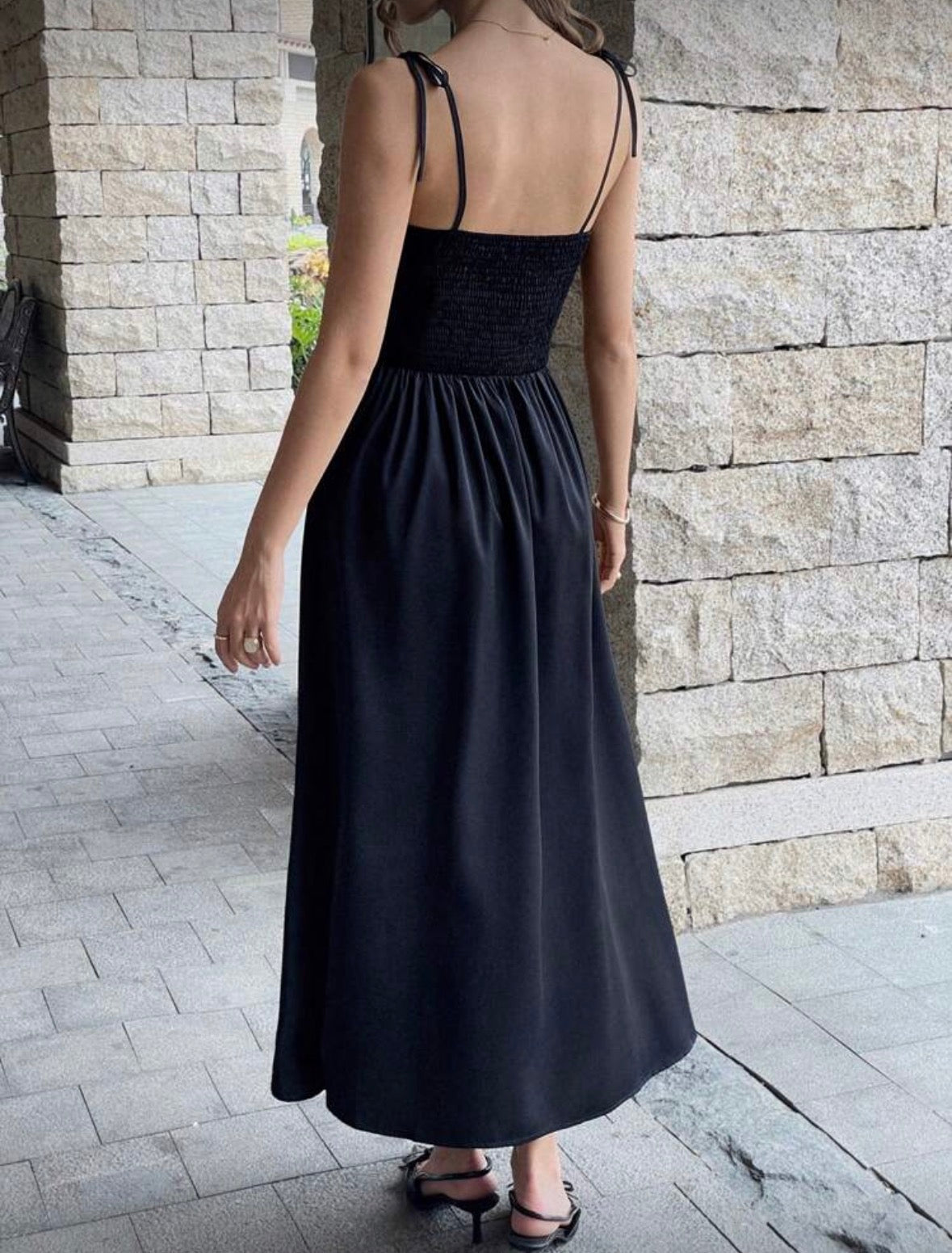 Women’s black and white sleeveless outer wear well sophisticated dress