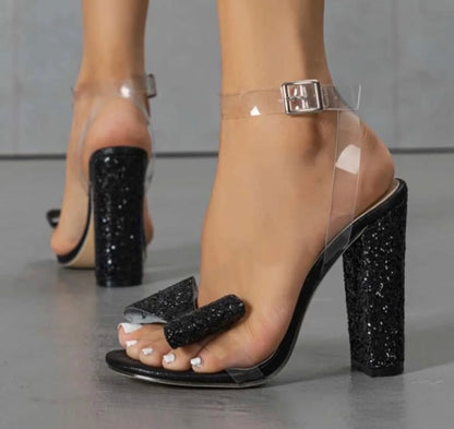 Women’s transparent shiny black high end heels