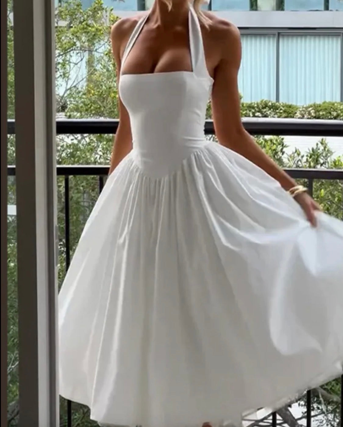 Women’s solid colour sleeveless strap on open chest elegant dress