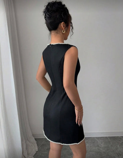 Women’s black solid colour design pearl bottom and neck line dress