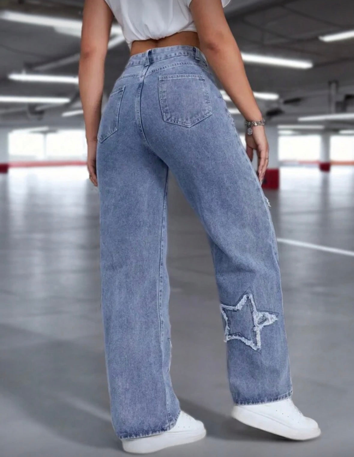 Medium wash star patterned denim pocket jeans