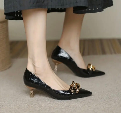 Women’s black with gold metal design pointed toe high end heels